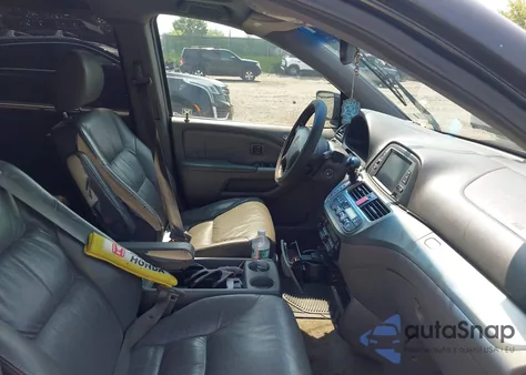 2010 Honda Odyssey Touring z USA, uszkodzony, nr VIN 5FNRL3H92AB059007